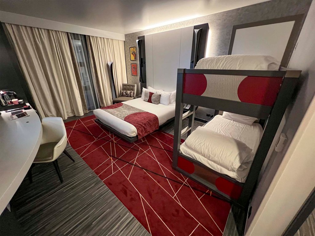 A Superior Terrace Room at Disney's Hotel New York: The Art of Marvel in Paris.