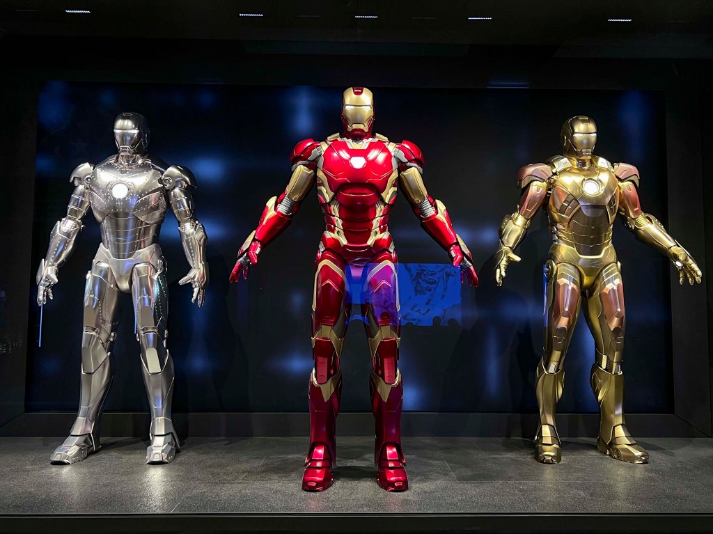 The Full-Size Iron Man Suits in the Hotel Lobby.