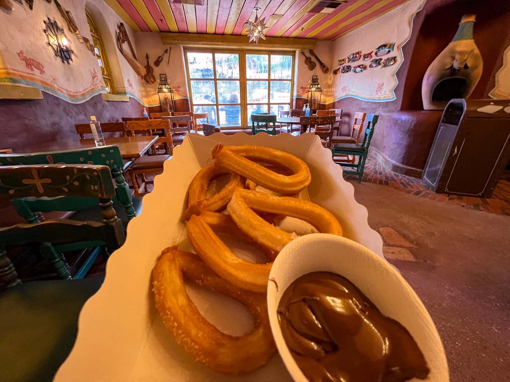 Churros with Nutella at Fuente del Oro in Frontierland at Disneyland Paris, 2021.