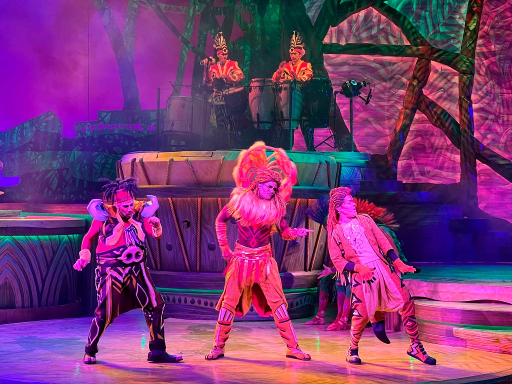 Pumba, Simba, and Timon in Lion King: Rhythms of the Pride Lands, Frontierland Theater, Disneyland Paris.