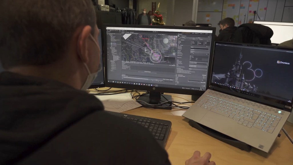 Visualisation of the 30th Anniversary logo in drone form above Sleeping Beauty Castle. 