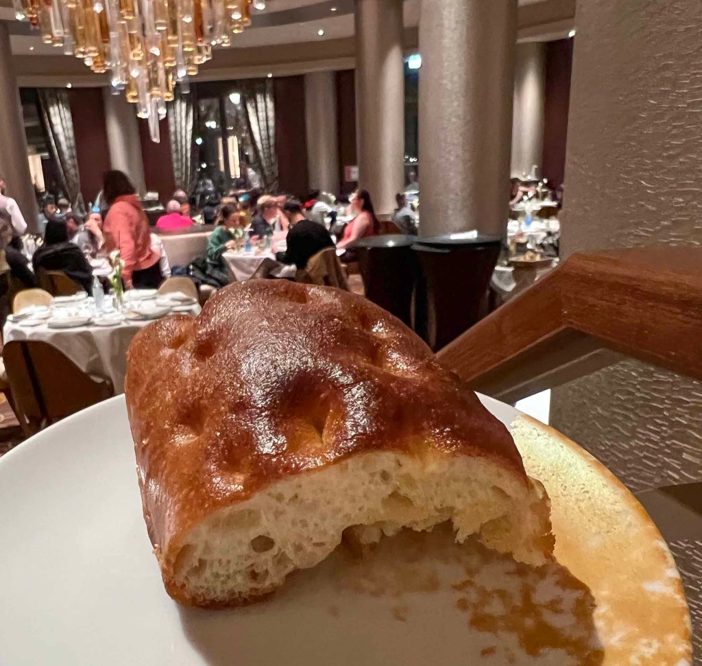 Fresh loaf of bread and olive oil (amuse-bouche) at the Manhattan Restaurant, Disneys Hotel New York: The Art of Marvel, Disneyland Paris.