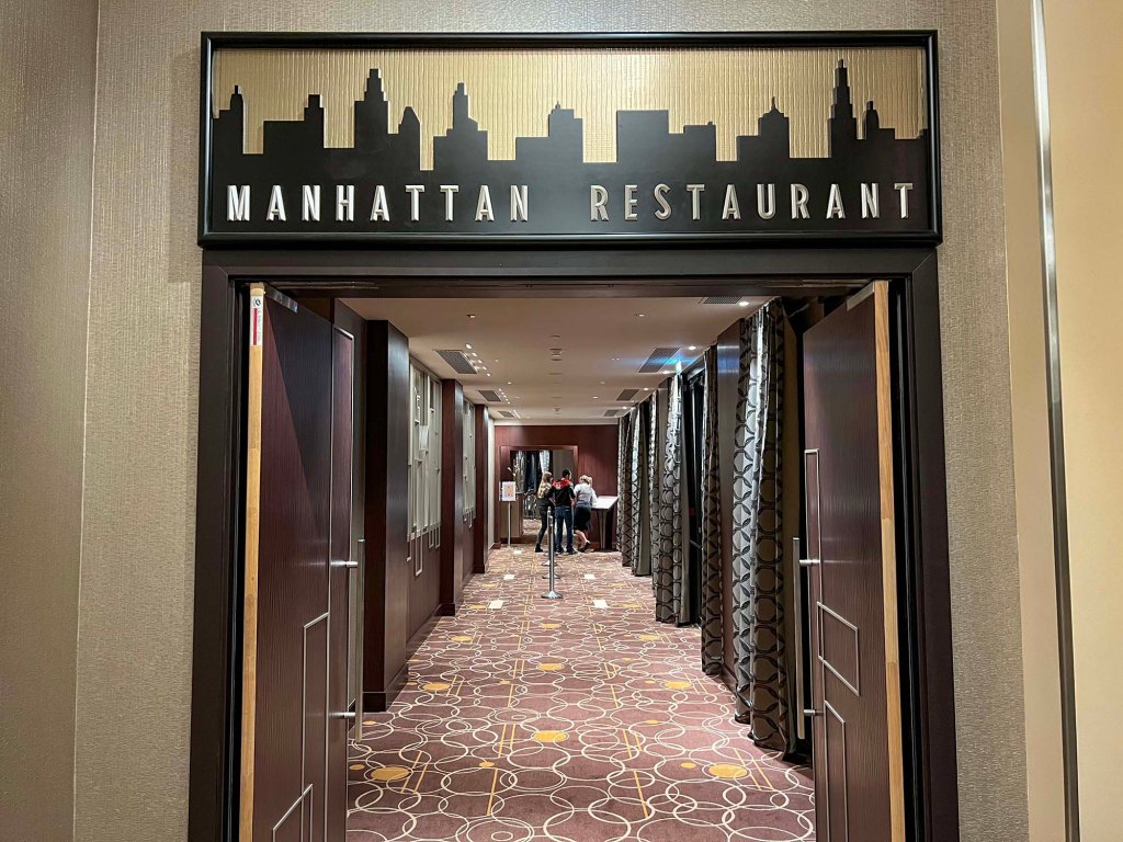 The entrance to the Manhattan Restaurant at Disneys Hotel New York: The Art of Marvel, Disneyland Paris.